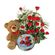 basket of red roses teddy bear and cookies. Kiev