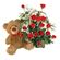 teddy bear with red roses. Kiev